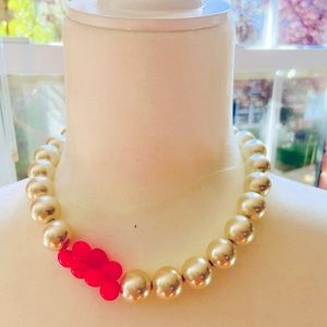 Chunky white round glass pearl necklace with pink chalcedony briolette accents.